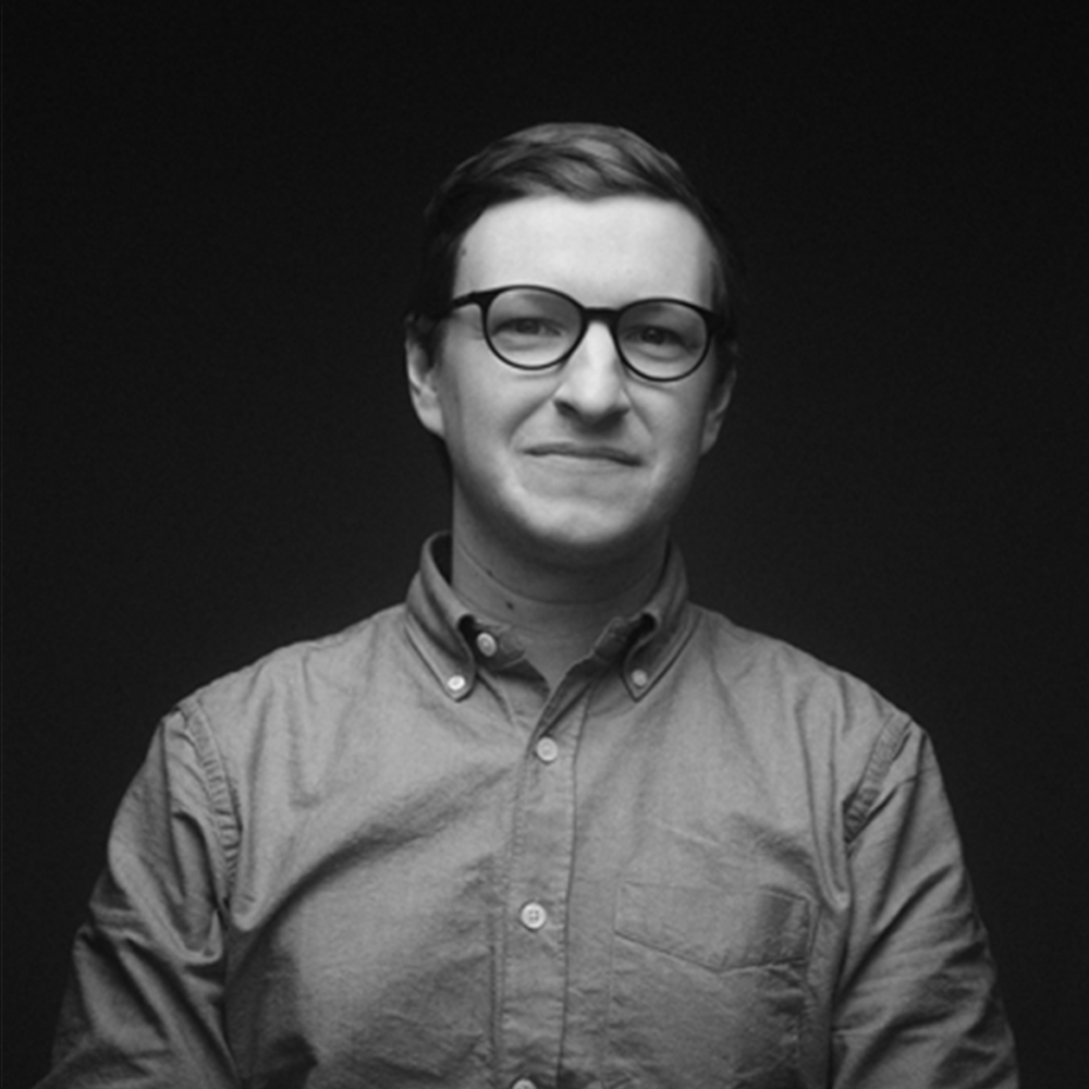 Portrait of Mitch Williams with a lightning-bolt silhouette behind him.